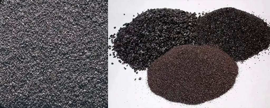 Mounds of aluminum oxide powder for blasting, with a close up of the granules
