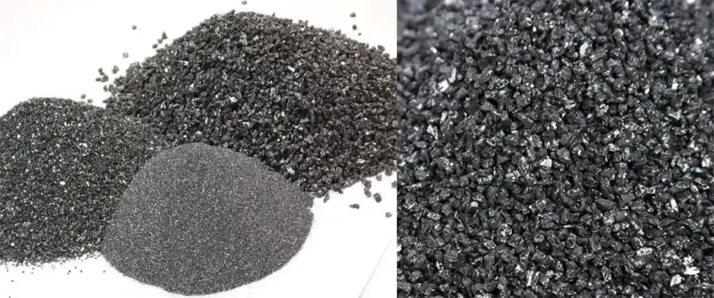 Mounds of silicon carbide powder for blasting, with a close up of the granules